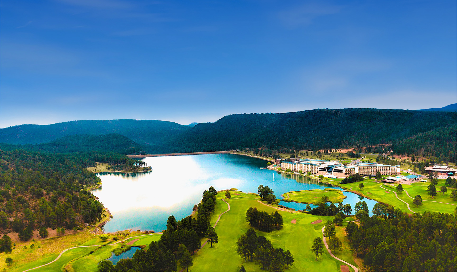 Panoramic view of Lake Mescalero and Inn of the Mountain Gods and Casino.